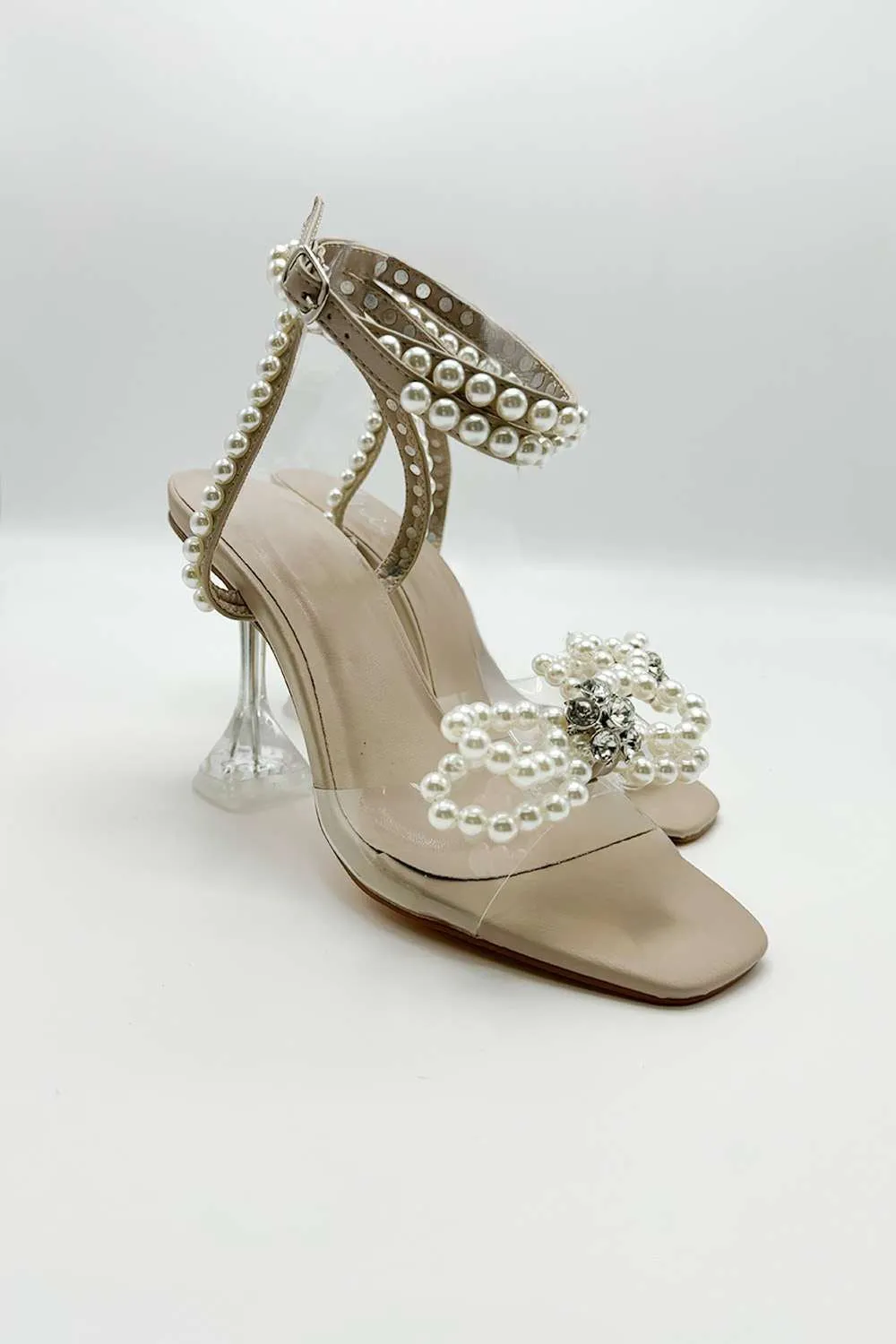 Pearlie Perspex Faux Pearl Bow Detail Heeled Sandals in Nude